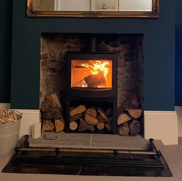 A wood-burning stove installed in a Somerset living room